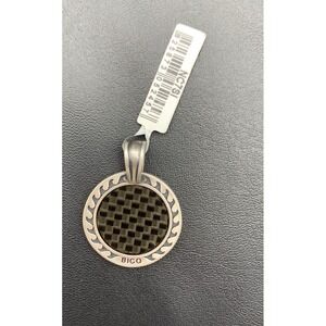 NWT Bico Carbon Fiber Sun Pendent With Black Cord Necklace Included